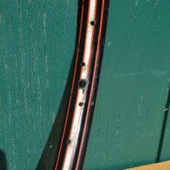 Felge 26 x 1,75, für Drahtbereifung, 36-loch, schwarz, Linierung rot/weiß 