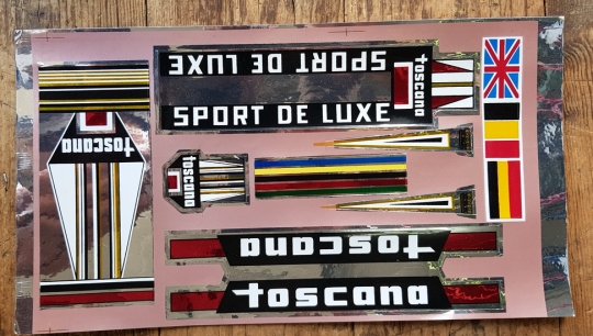 Aufklebersatz  "TOSCANA", univ. Folienaufkleber passend für 70-80er Jahre Fahrräder, orig. alte Neuware. 